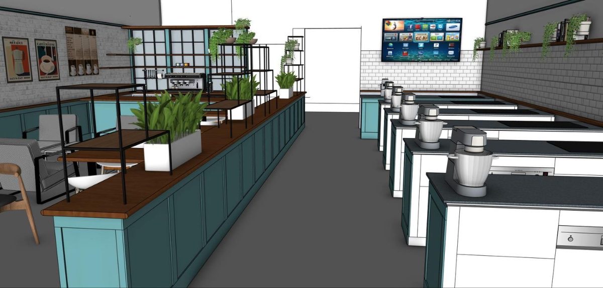 Design render of the Project 2nd Chance training floor: a coffee bar and a row of cookery islands inside the old boiler house at HMP Pentonville.